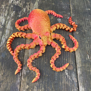 3D printed articulated octopus sea creature in dark rainbow colourway Pilola