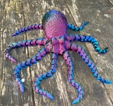 3D Printed articulated octopus sea creature in red blue green colourway Pilola