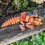 3D printed large articulated gecko reptile in red gold colourway Pilola